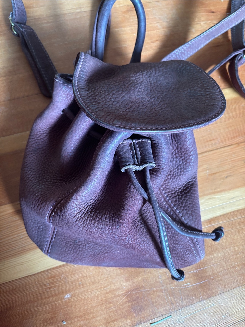Coach Pebbled Leather Drawstring Backpack in Dark Brown